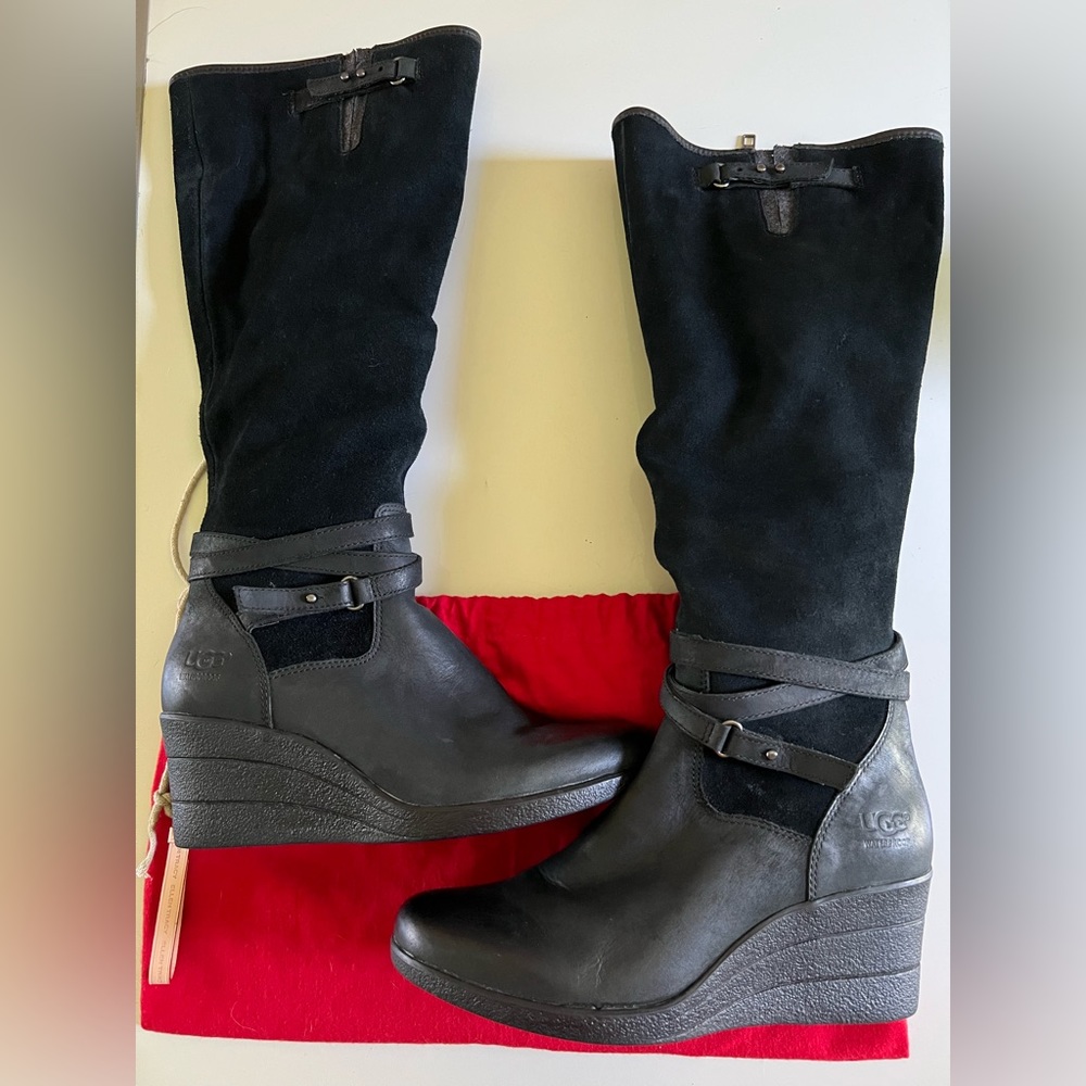 UGG boots. Tall. Leather/suede material. Great condition!! Size 7. WATERPROOF!!